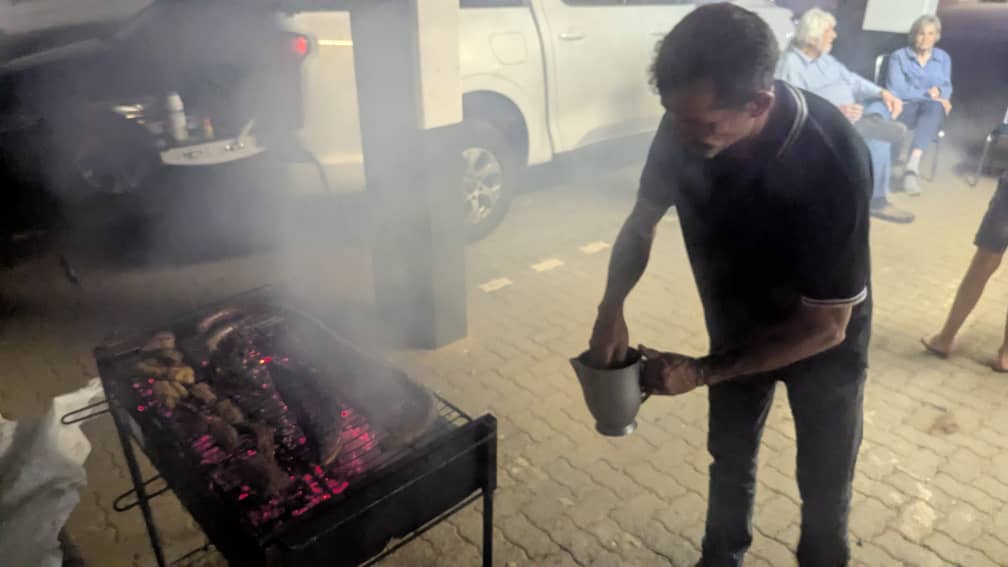Evening braai event with festive lighting